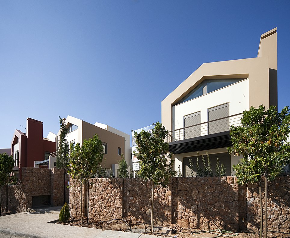 Contemporary residential architecture with stone boundary walls